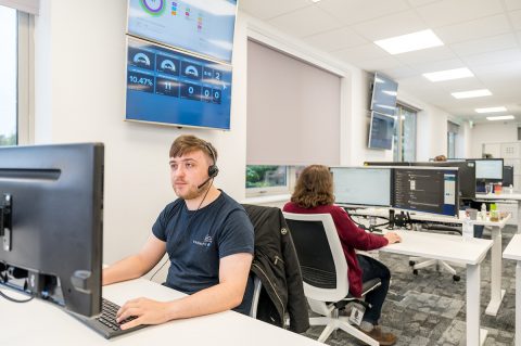 Rory and Andy in the Breakwater office at their desks