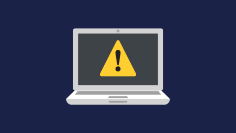 Warning triangle on a Laptop graphic