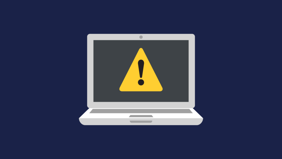 Warning triangle on a Laptop graphic
