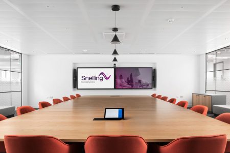Boardroom with Snellings logo on screen