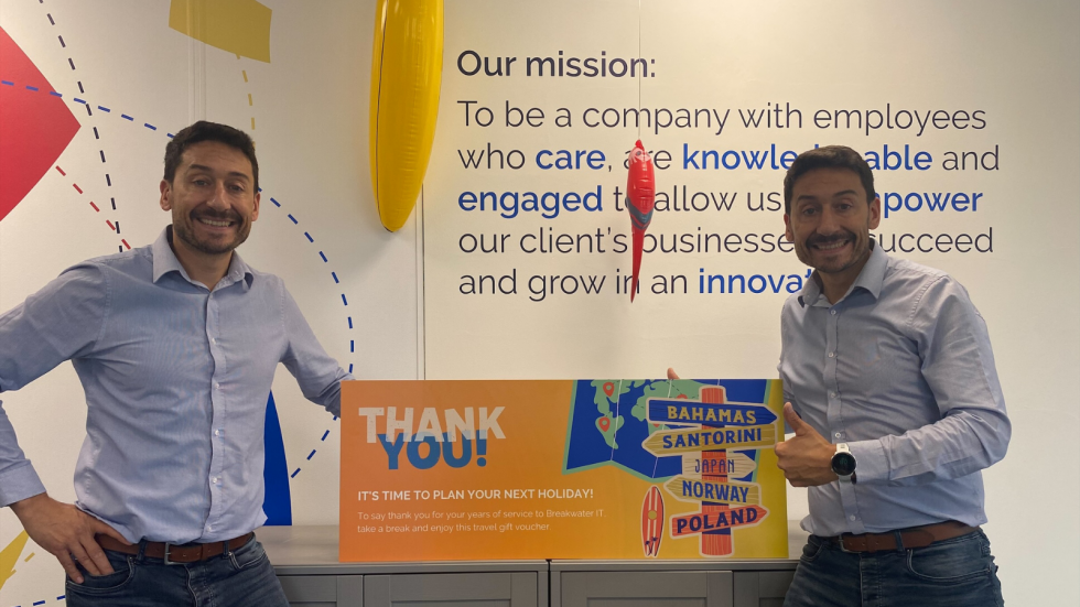 John giving himself a 10-year anniversary cheque for a holiday.