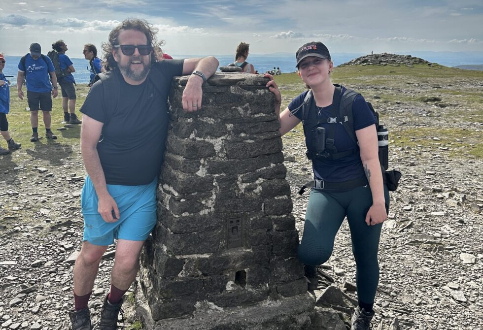 Andy and Sam at the top of a Ingleborough peak.