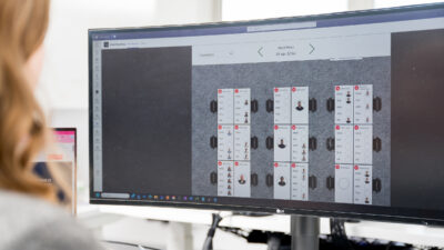 Wide Screen monitor showing Breakwater IT's desk booking application.