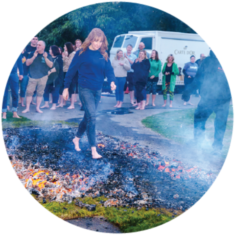 Jordan Lamb taking part in a fire walk. Jordan Lamb taking part in a fire walk.